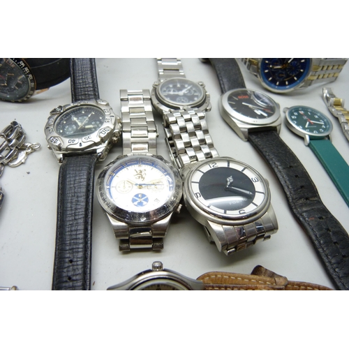 2058 - A collection of lady's and gentleman's wristwatches; Boss, Fossil, Citizen, Nautica, etc.