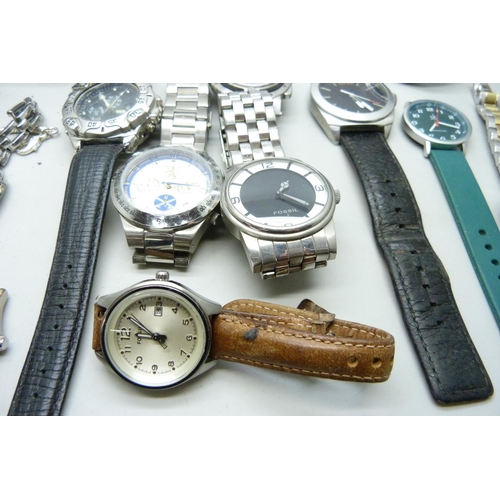 2058 - A collection of lady's and gentleman's wristwatches; Boss, Fossil, Citizen, Nautica, etc.