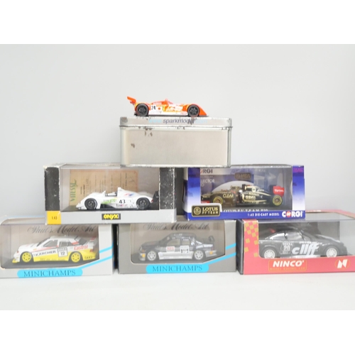 2073 - Eight model racing cars, boxed