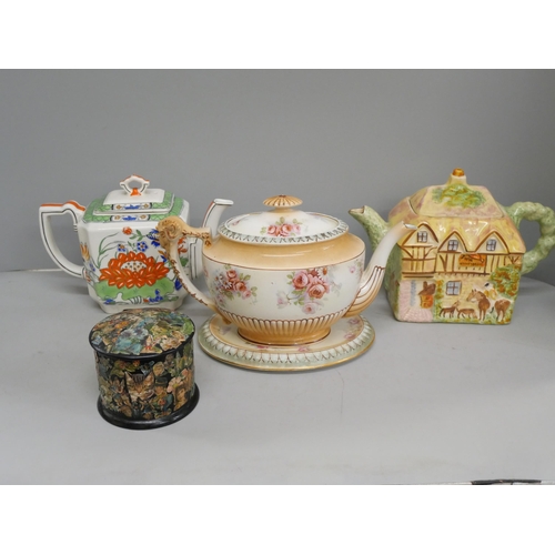 2094 - An English Staffordshire cottage teapot, a Mason's Ironstone teapot, English teapot and stand and a ... 