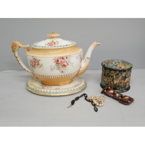 2094 - An English Staffordshire cottage teapot, a Mason's Ironstone teapot, English teapot and stand and a ... 