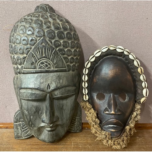 254 - Two African carved hardwood masks