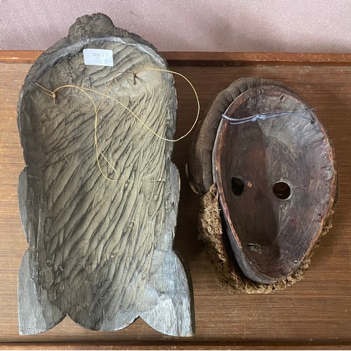 254 - Two African carved hardwood masks