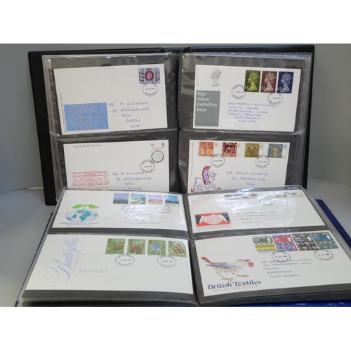 2129 - A large collection of stamps, first day covers, etc.