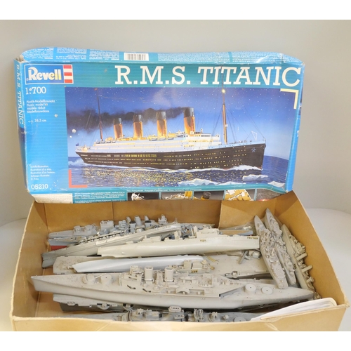 2134 - A box of model battleships and a Revell Titanic model kit