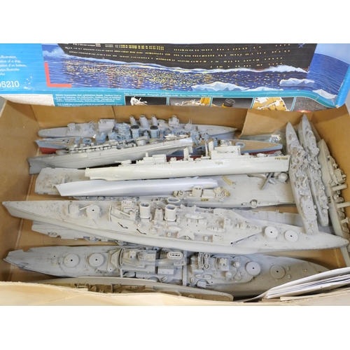 2134 - A box of model battleships and a Revell Titanic model kit