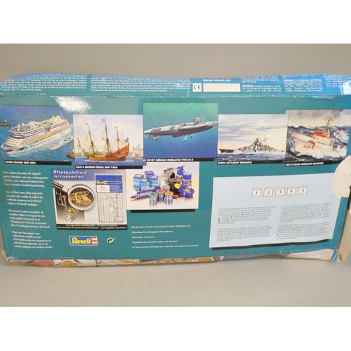 2134 - A box of model battleships and a Revell Titanic model kit