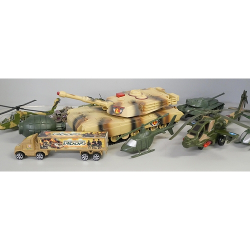 2157 - A collection of plastic toy soldiers, tank, aircraft and helicopters **PLEASE NOTE THIS LOT IS NOT E... 