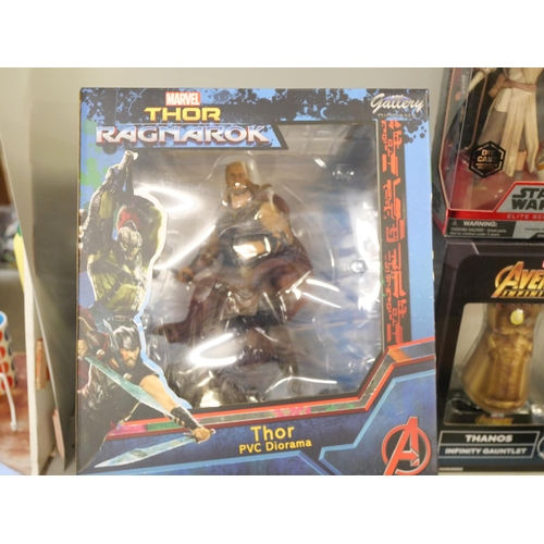 2179 - A collection of character figures, Marvel Thor, The Catman from Kiss, Star Wars Rey and BB-8, etc.