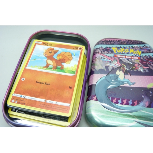 2186 - Over 600 Pokémon cards in collectors box and tin, contains a variety of holographic including rares