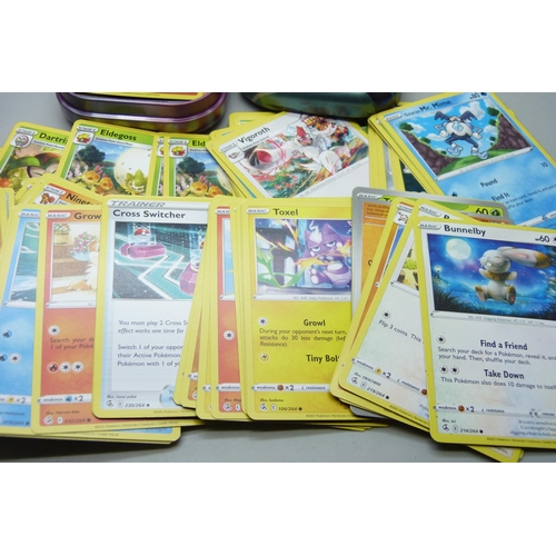 2186 - Over 600 Pokémon cards in collectors box and tin, contains a variety of holographic including rares