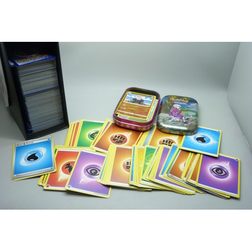 2187 - Over 600 Pokémon cards in collectors box and tin, contains a variety of holographic including rares