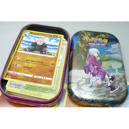 2187 - Over 600 Pokémon cards in collectors box and tin, contains a variety of holographic including rares