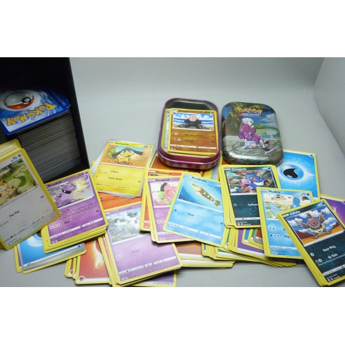 2187 - Over 600 Pokémon cards in collectors box and tin, contains a variety of holographic including rares