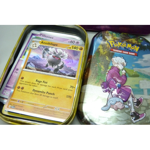 2188 - Over 600 Pokémon cards in two tins, contains holos