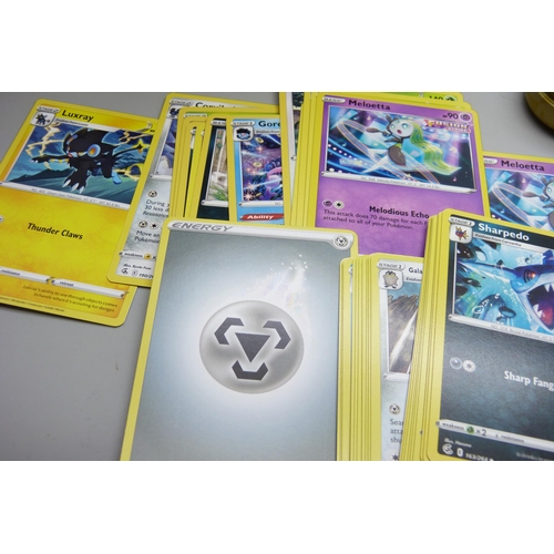 2188 - Over 600 Pokémon cards in two tins, contains holos