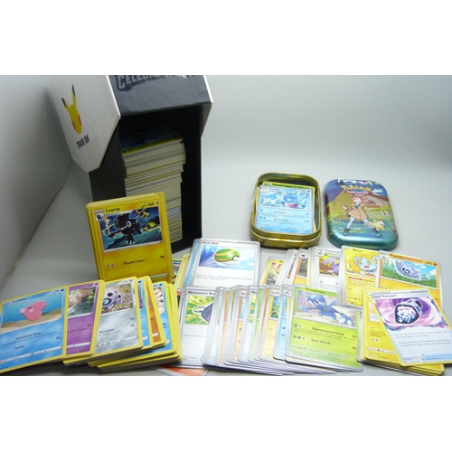 2190 - Over 600 Pokémon cards in collectors box and tin, contains a variety of holographic including rares