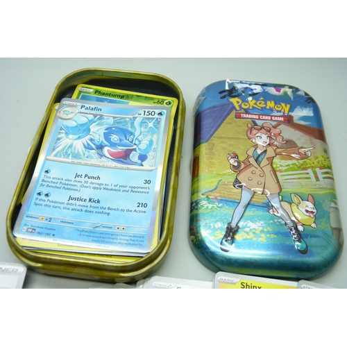 2190 - Over 600 Pokémon cards in collectors box and tin, contains a variety of holographic including rares