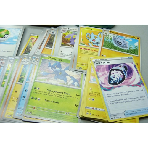 2190 - Over 600 Pokémon cards in collectors box and tin, contains a variety of holographic including rares