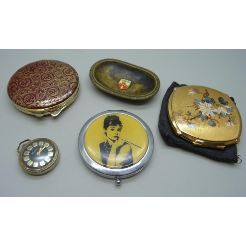 2194 - A set of two Stratton compacts and one other, a lady's pendant watch and brass tray