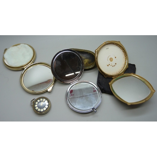 2194 - A set of two Stratton compacts and one other, a lady's pendant watch and brass tray