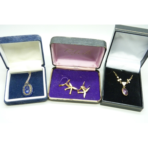 2200 - A vintage amethyst necklace, vintage blue glass  pendant and a pair of Gurkha cufflinks