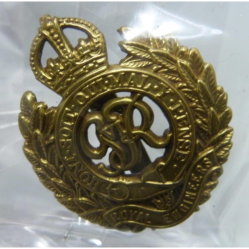 2222 - A collection of regimental pin badges including Royal Dublin Fusiliers, The Royal Scots, Royal Corps... 