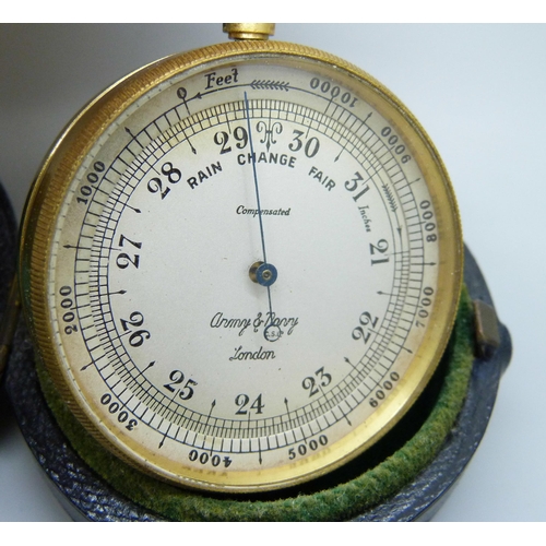 2225 - An Army and Navy gilt brass pocket barometer, cased