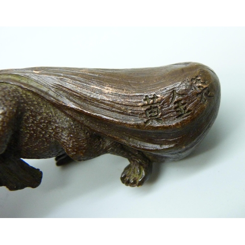 2229 - An oriental small bronze rat with sack