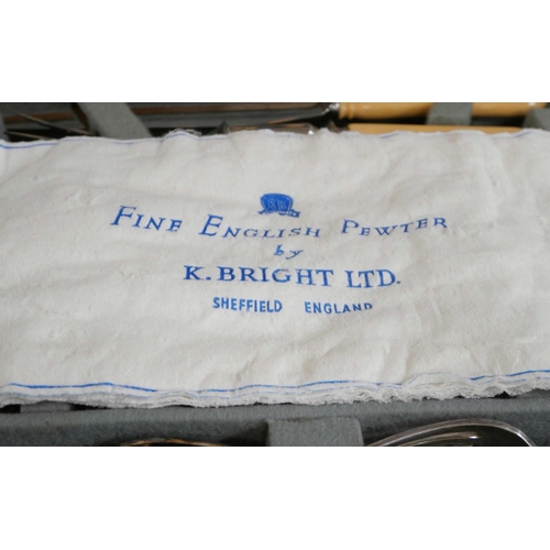 2264 - A walnut canteen of silver plated cutlery, knives with faux ivory handles