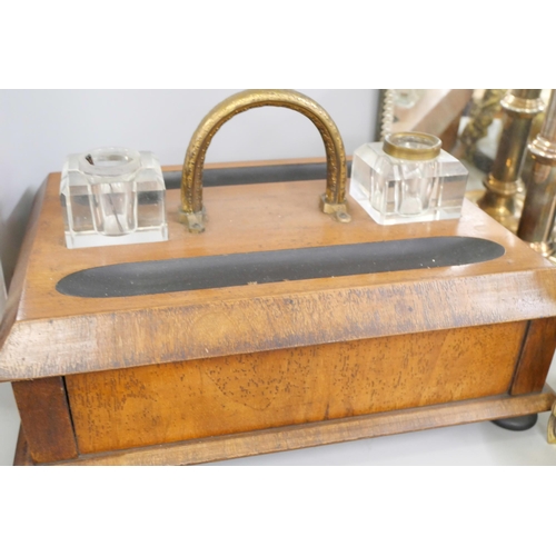 2277 - An Edwardian mirrored tray, a mahogany letter rack, desk stand, pair of candlesticks and a table gon... 