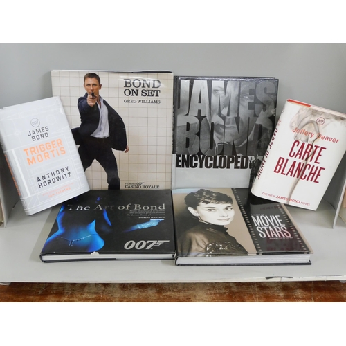 2292 - A box of books on James Bond 007 and a three volume set in slipcase, The Spectre Trilogy **PLEASE NO... 