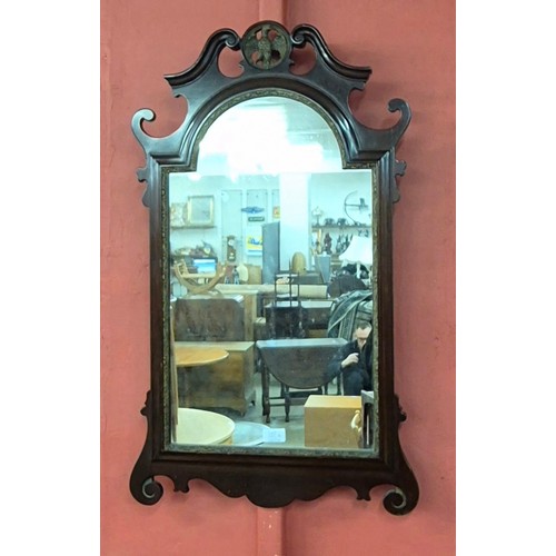 293A - A George II style mahogany and parcel gilt framed mirror