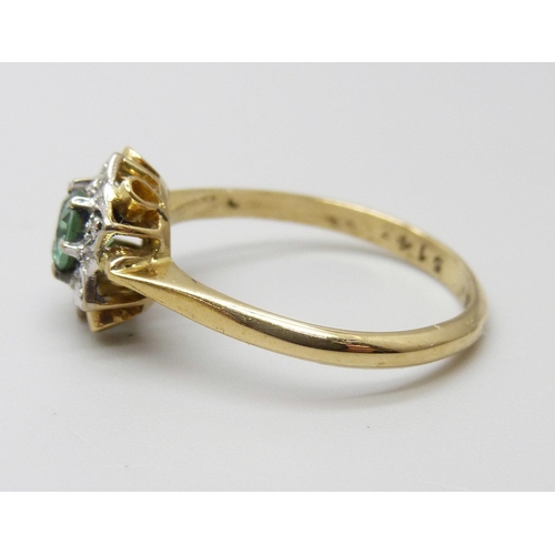 7005 - An 18ct gold, turquoise colour stone and diamond cluster ring, 2.7g, N