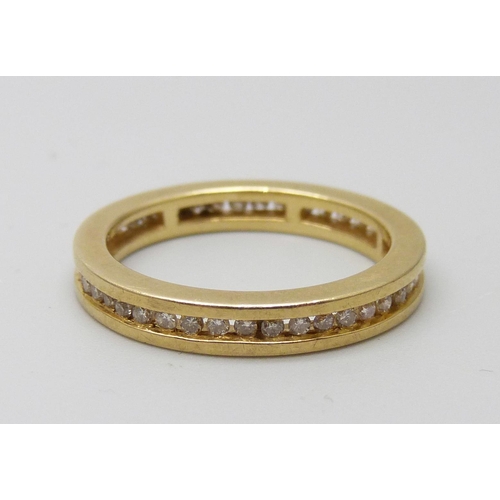 7014 - An 18ct gold and diamond eternity ring, 3.9g, L