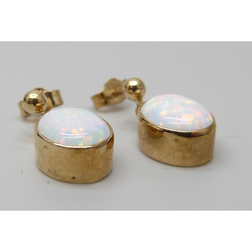 7026 - A pair of 9ct gold and synthetic opal earrings, 2.5g