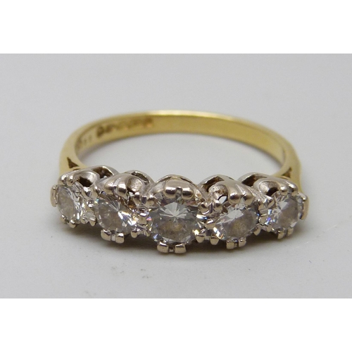 7041 - An 18ct gold and five stone diamond ring, 3.5g, N, over 1 carat total diamond weight