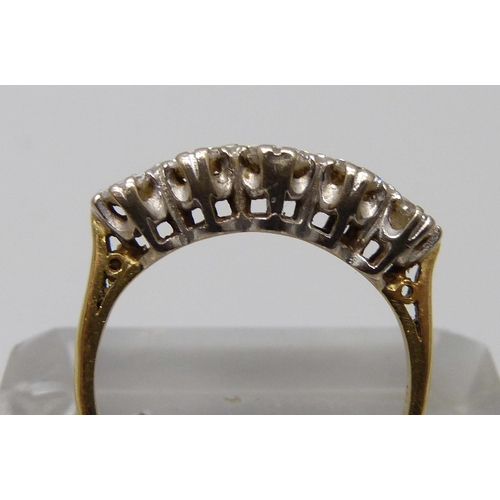 7041 - An 18ct gold and five stone diamond ring, 3.5g, N, over 1 carat total diamond weight