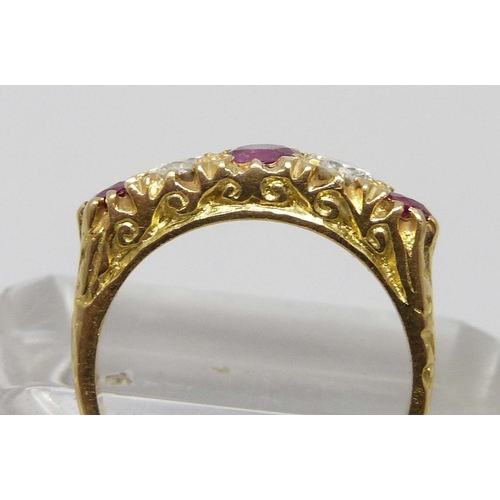 7049 - An 18ct gold, ruby and diamond ring, 5g, L, diamonds approximately 0.25 carat each