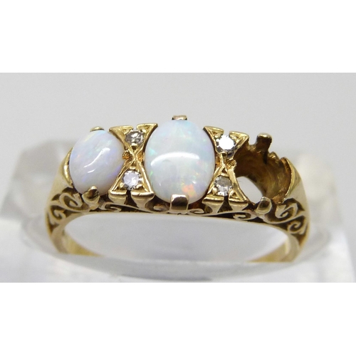 7050 - An 18ct gold, opal and diamond ring, lacking one opal, 4.2g, O/P