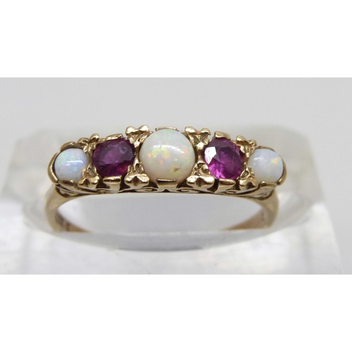 7053 - A 9ct gold, Victorian style opal and ruby ring, 2.2g, P