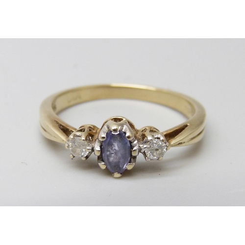 7054 - A 9ct gold, blue stone and diamond set ring, 2g, M