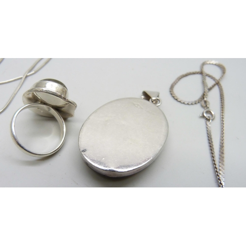 7063 - Two silver mounted pendants and chains, two other silver mounted pendants, a silver ring, Q, and a s... 