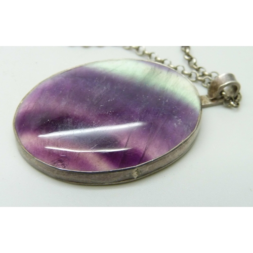 7073 - A large silver mounted Blue John pendant and chain