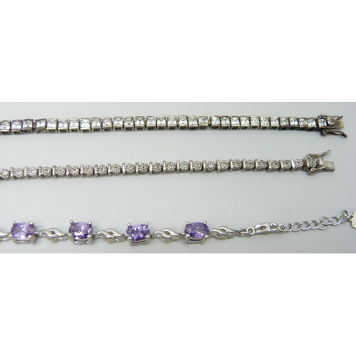 7075 - Three silver bracelets and one other set with green stones