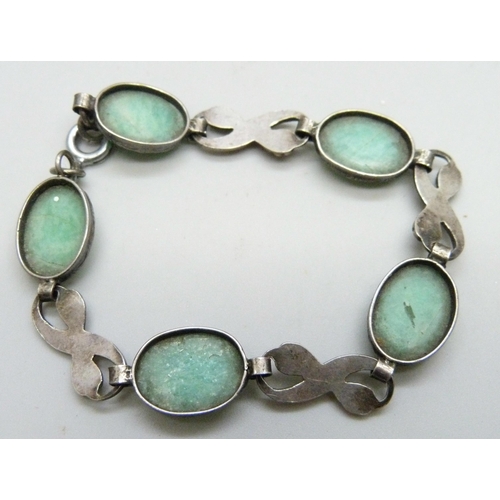 7075 - Three silver bracelets and one other set with green stones