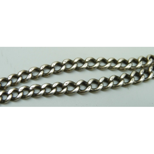 7084 - A silver double Albert chain, metal clips, 38g