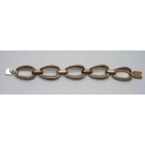 7087 - A silver bracelet marked Mexico, 78g, 21.5cm