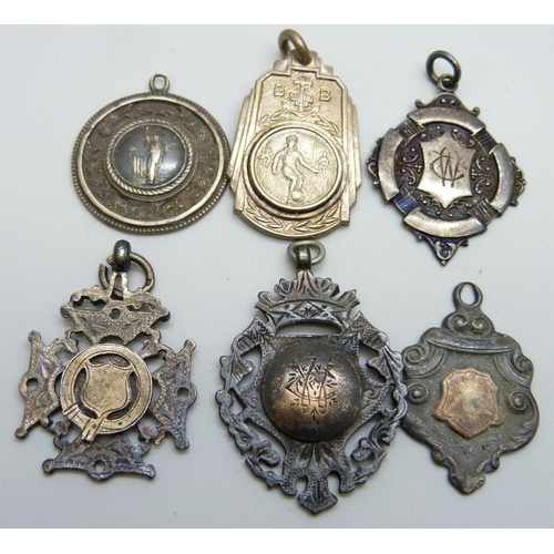 7097 - Five silver fob medals including one cricket and one other fob medal, (41g of silver)