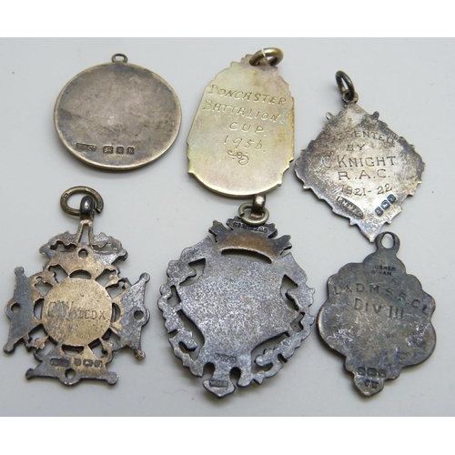 7097 - Five silver fob medals including one cricket and one other fob medal, (41g of silver)